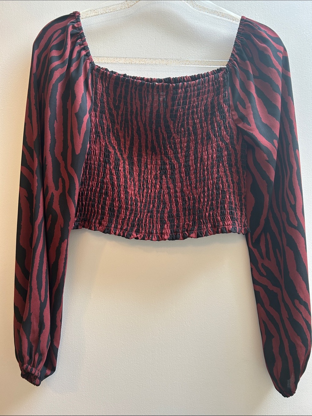 Sadie & Sage Burgundy & Black Smocked Zebra Print Crop Long Sleeve Top